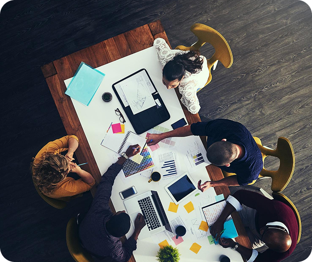 Team collaborating around a meeting table